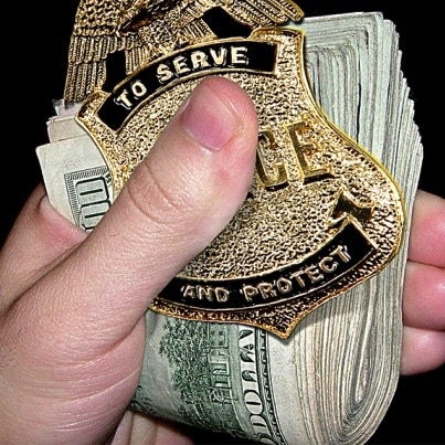 police badge and cash